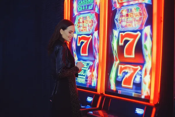 SPORTYBEF — A high-class gaming experience without limits A woman in a luxurious green gown next to an ornate roulette wheel, capturing the upscale casino mood of SPORTYBEF.